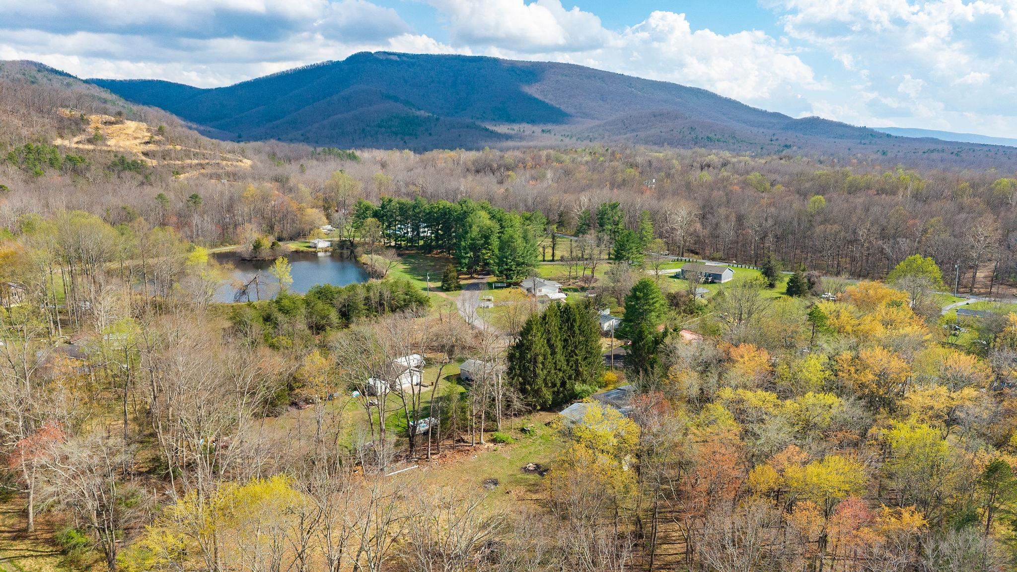 Lot 19 Crimora Mine Road Crimora, VA 24431 - Photo 41 of 49 a view of a lake with mountains in the background