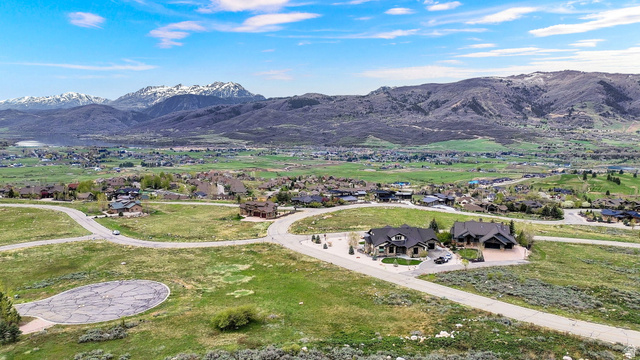 3722 Porcupine Ridge Drive, Unit 105 Eden, UT 84310 - Photo 3 of 22 Aerial view of residential area with mountains