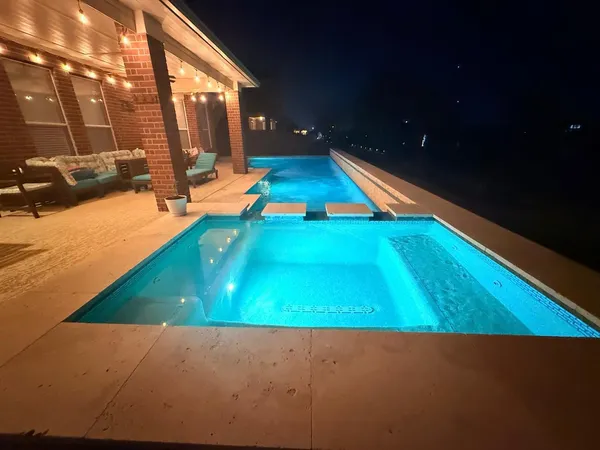 a view of an outdoor space and swimming pool