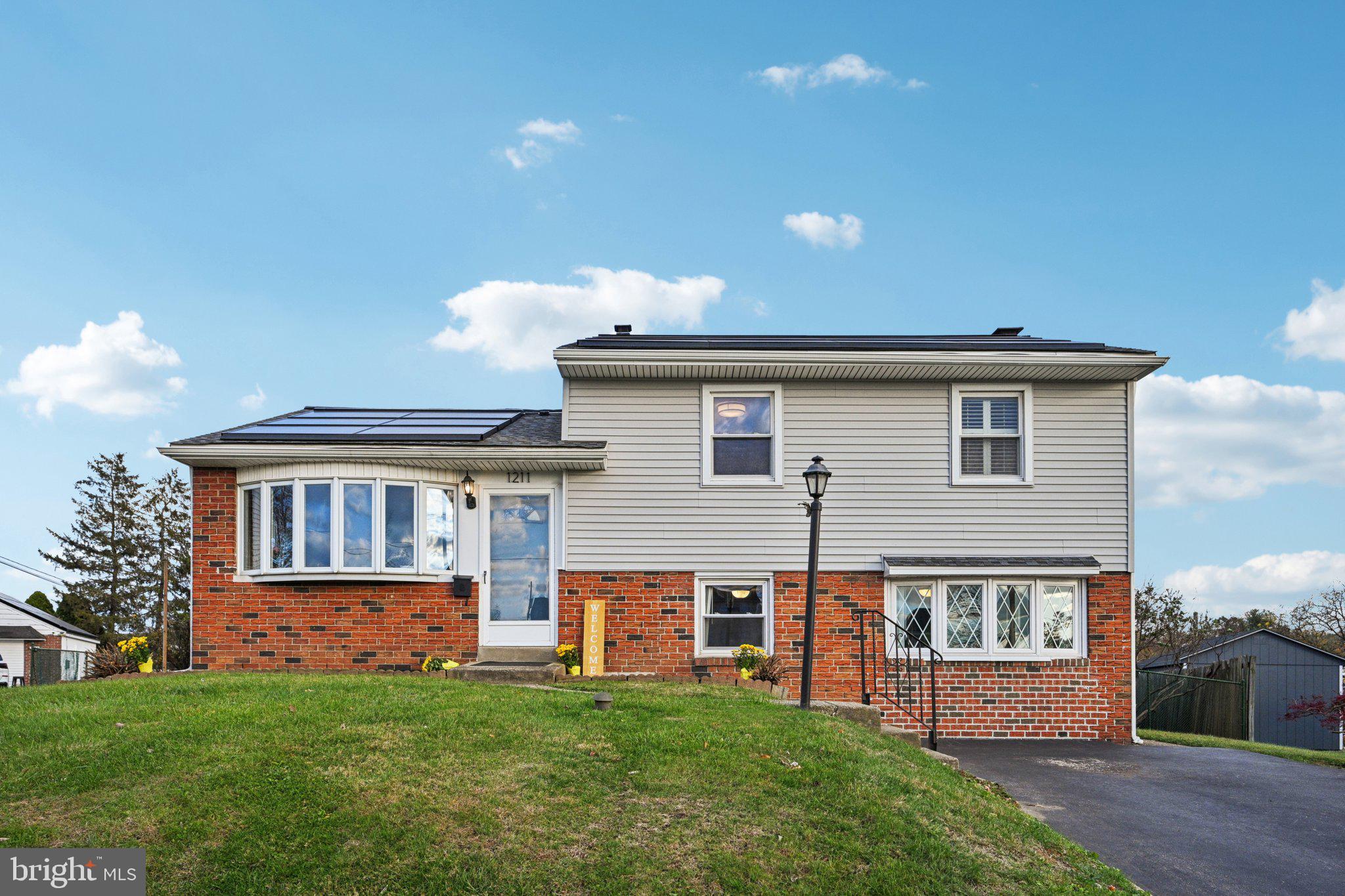 a house view with a garden space