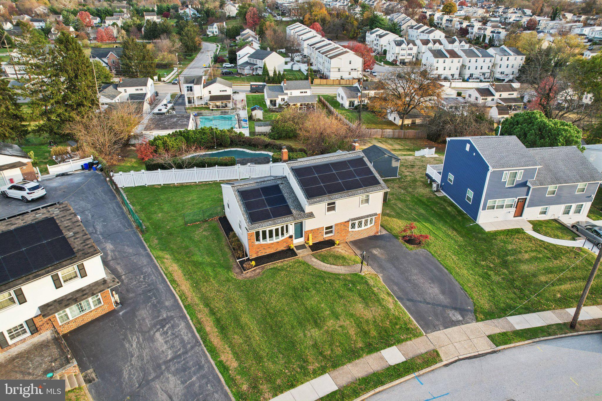 1211 Woodside Road Conshohocken, PA 19428 - Photo 1 of 55 an aerial view of a house with a garden and trees