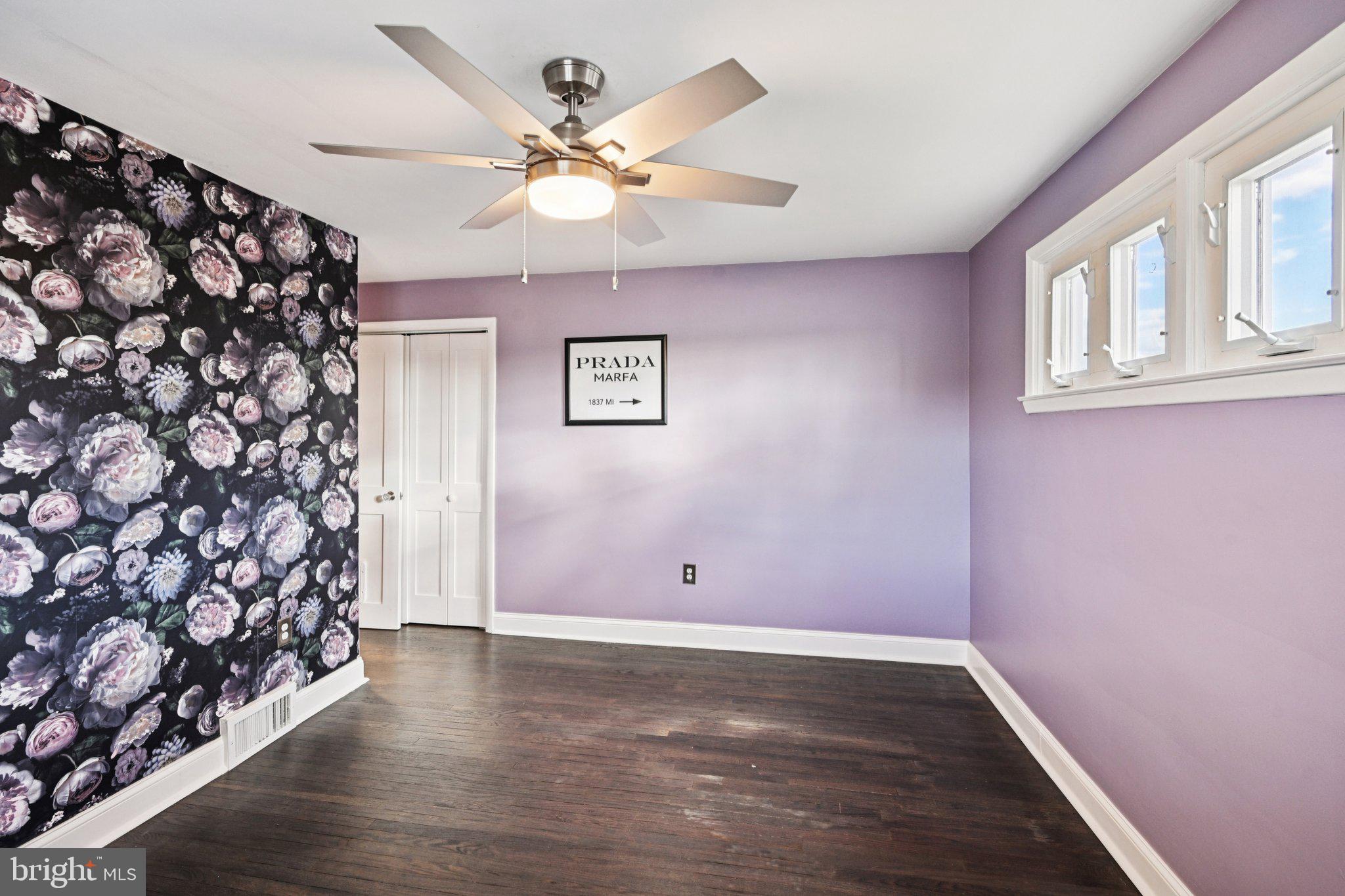 1211 Woodside Road Conshohocken, PA 19428 - Photo 21 of 55 a view of a livingroom with wooden floor and a window