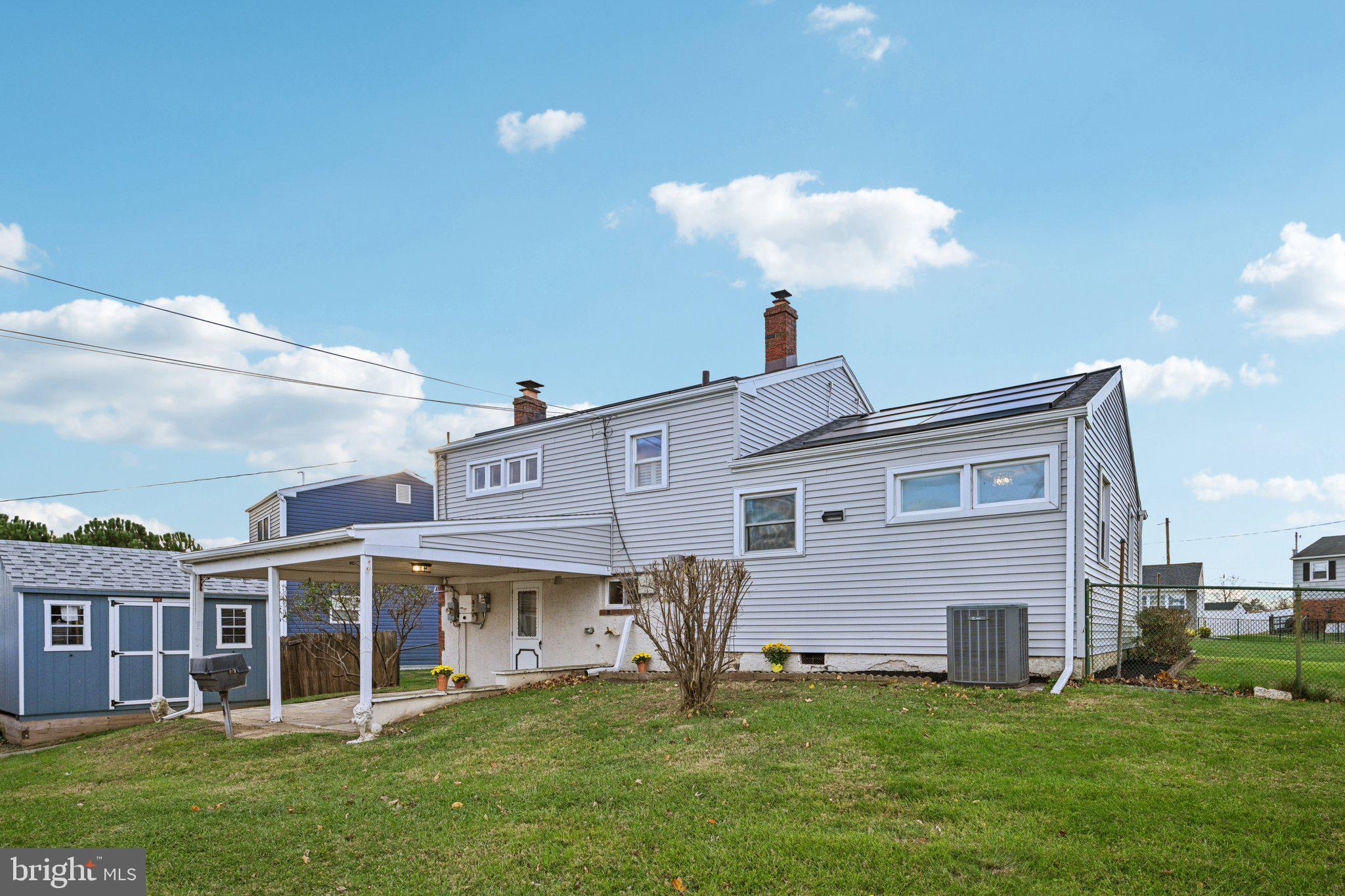 1211 Woodside Road Conshohocken, PA 19428 - Photo 33 of 55 a view of a house with a yard and plants