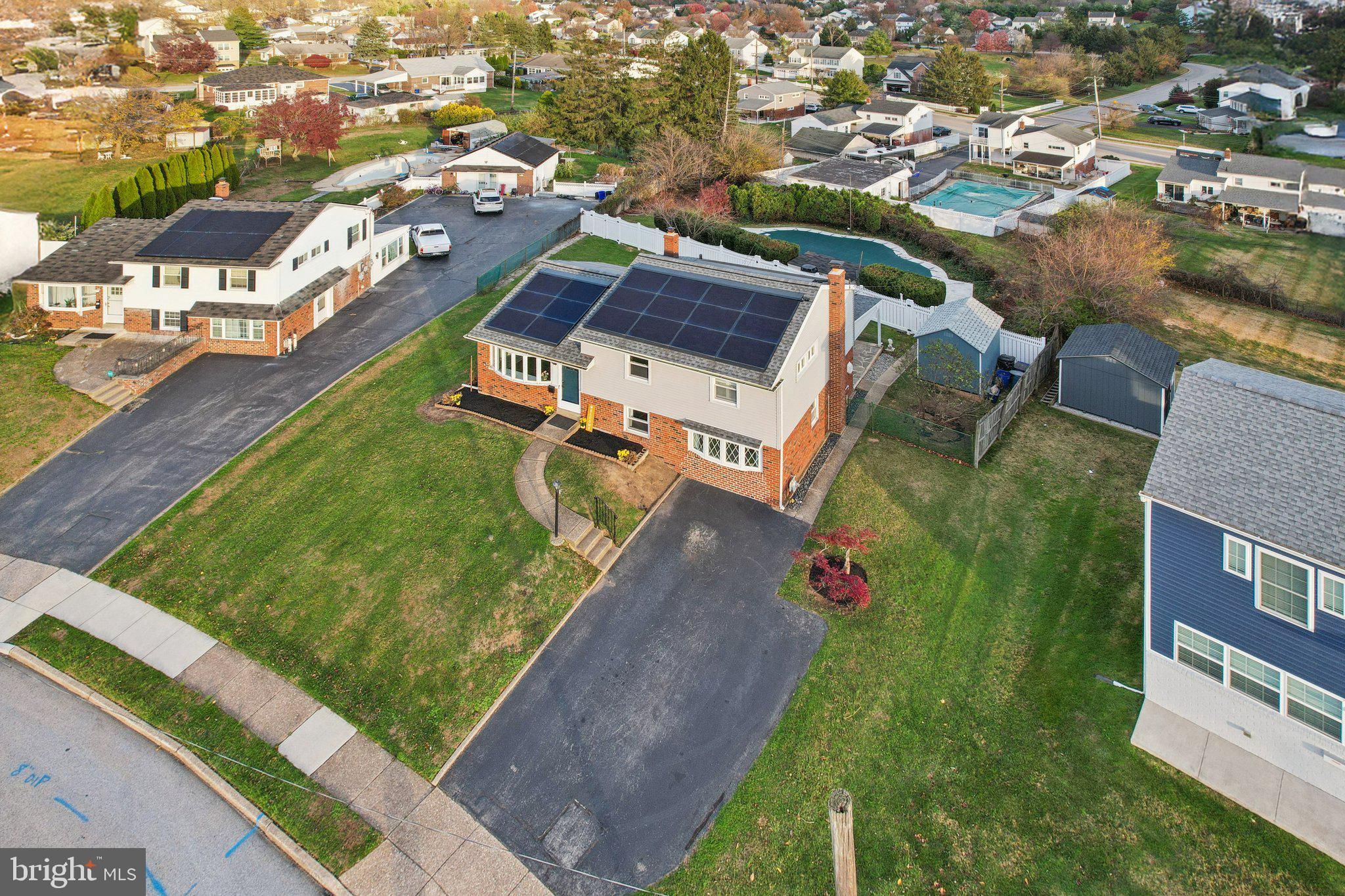 1211 Woodside Road Conshohocken, PA 19428 - Photo 44 of 55 an aerial view of a house with a garden