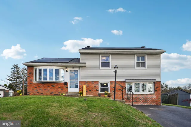a view of a swimming pool with a backyard