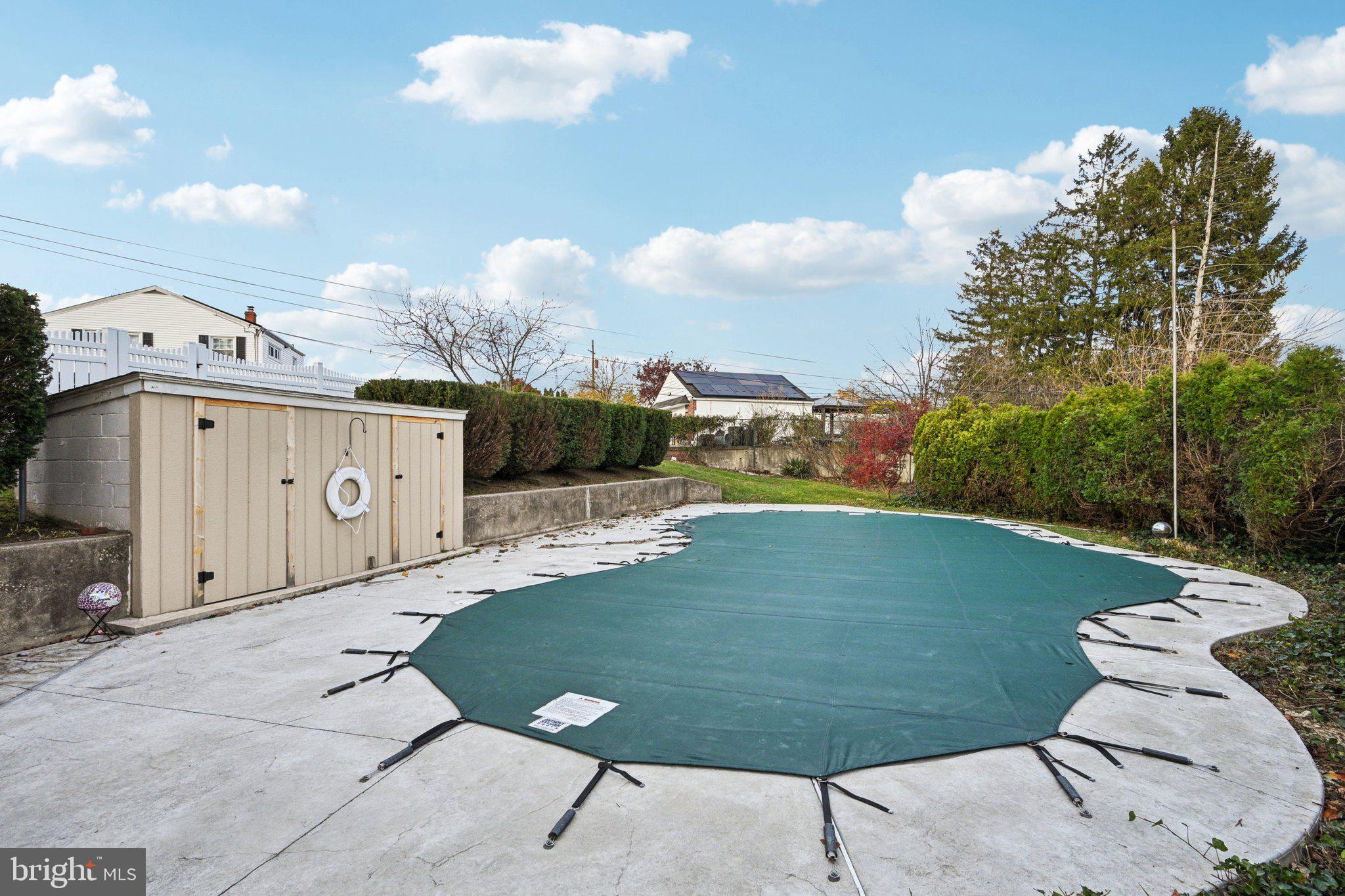 1211 Woodside Road Conshohocken, PA 19428 - Photo 7 of 55 a view of a swimming pool with a backyard