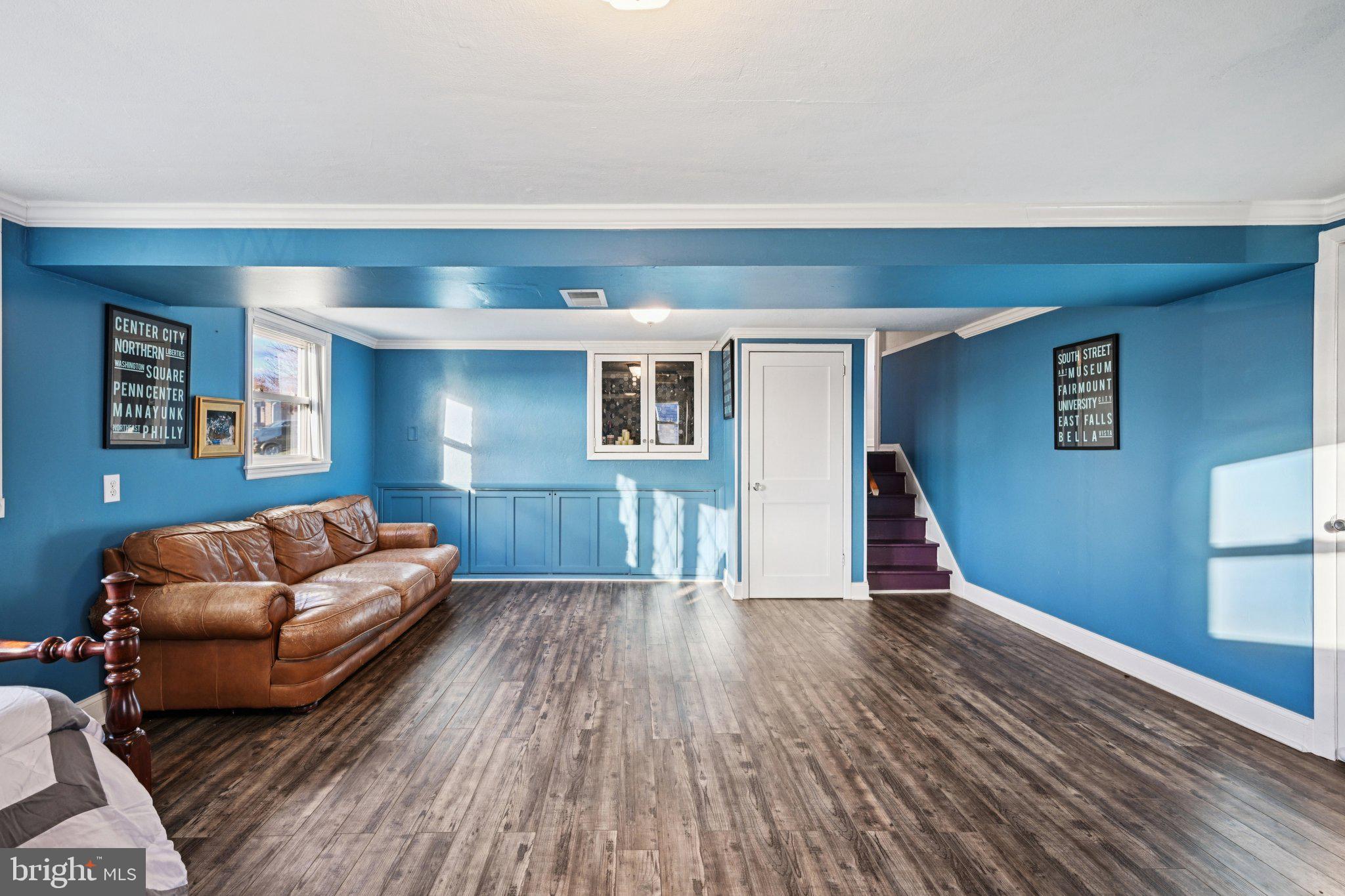 1211 Woodside Road Conshohocken, PA 19428 - Photo 8 of 55 a living room with furniture and a wooden floor