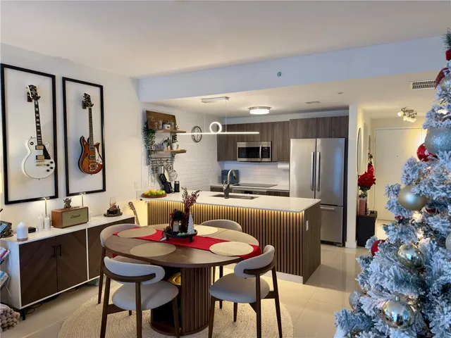 a view of a dining room with furniture