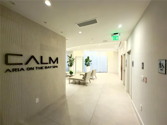 a view of a swimming pool with a yard