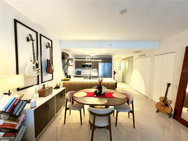 a living room with dining room