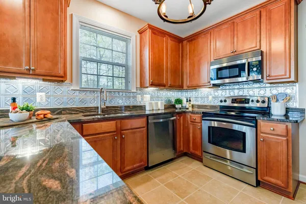 $569,900 | 7860 Rolling Woods Court, Unit 4M4, Springfield, VA 22152