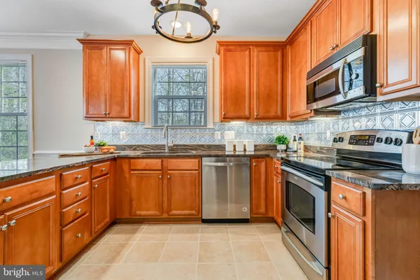 $569,900 | 7860 Rolling Woods Court, Unit 4M4, Springfield, VA 22152