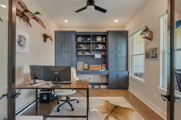 a view of a workspace with furniture