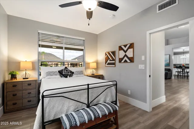 a view of a balcony with sitting area