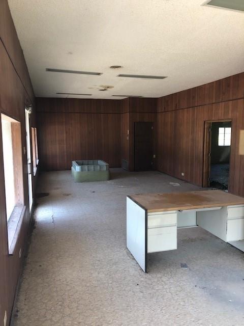 812 West 7th Street Bonham, TX 75418 - Photo 5 of 18 a living room with stainless steel appliances kitchen island granite countertop furniture and a fireplace