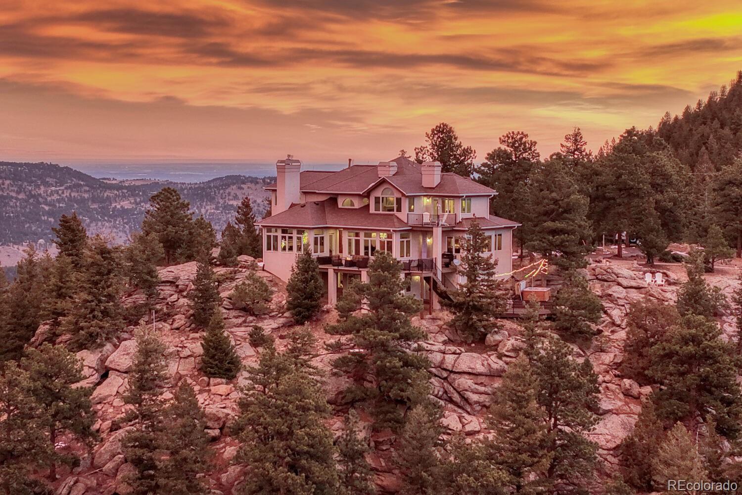 26344 Independence Trail Evergreen, CO 80439 - Photo 1 of 50 a view of a city with mountain