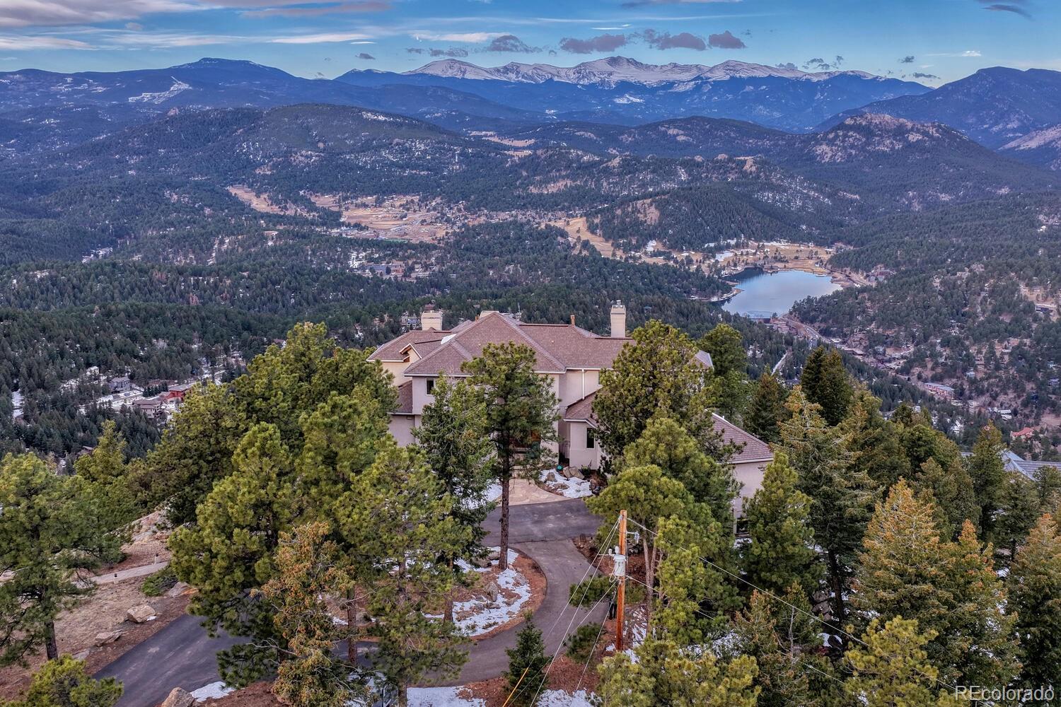 26344 Independence Trail Evergreen, CO 80439 - Photo 2 of 50 an aerial view of residential house with green space
