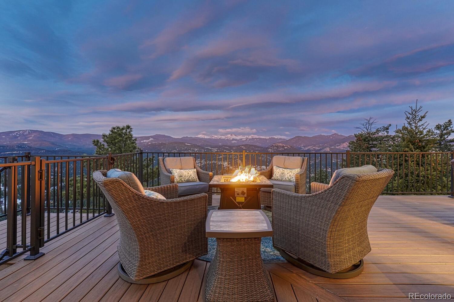 26344 Independence Trail Evergreen, CO 80439 - Photo 28 of 50 a view of a roof deck with furniture