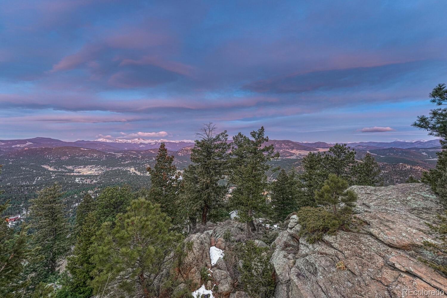 26344 Independence Trail Evergreen, CO 80439 - Photo 29 of 50 a view of a city with lush green forest