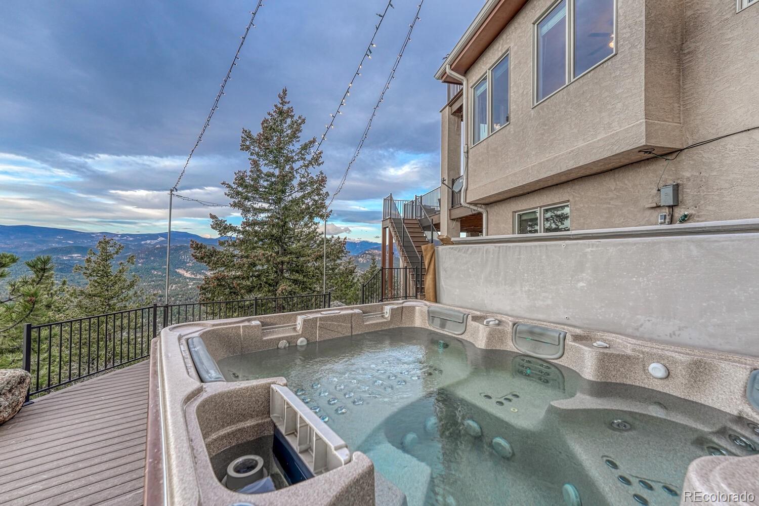 26344 Independence Trail Evergreen, CO 80439 - Photo 39 of 50 a view of a sink and table in the balcony