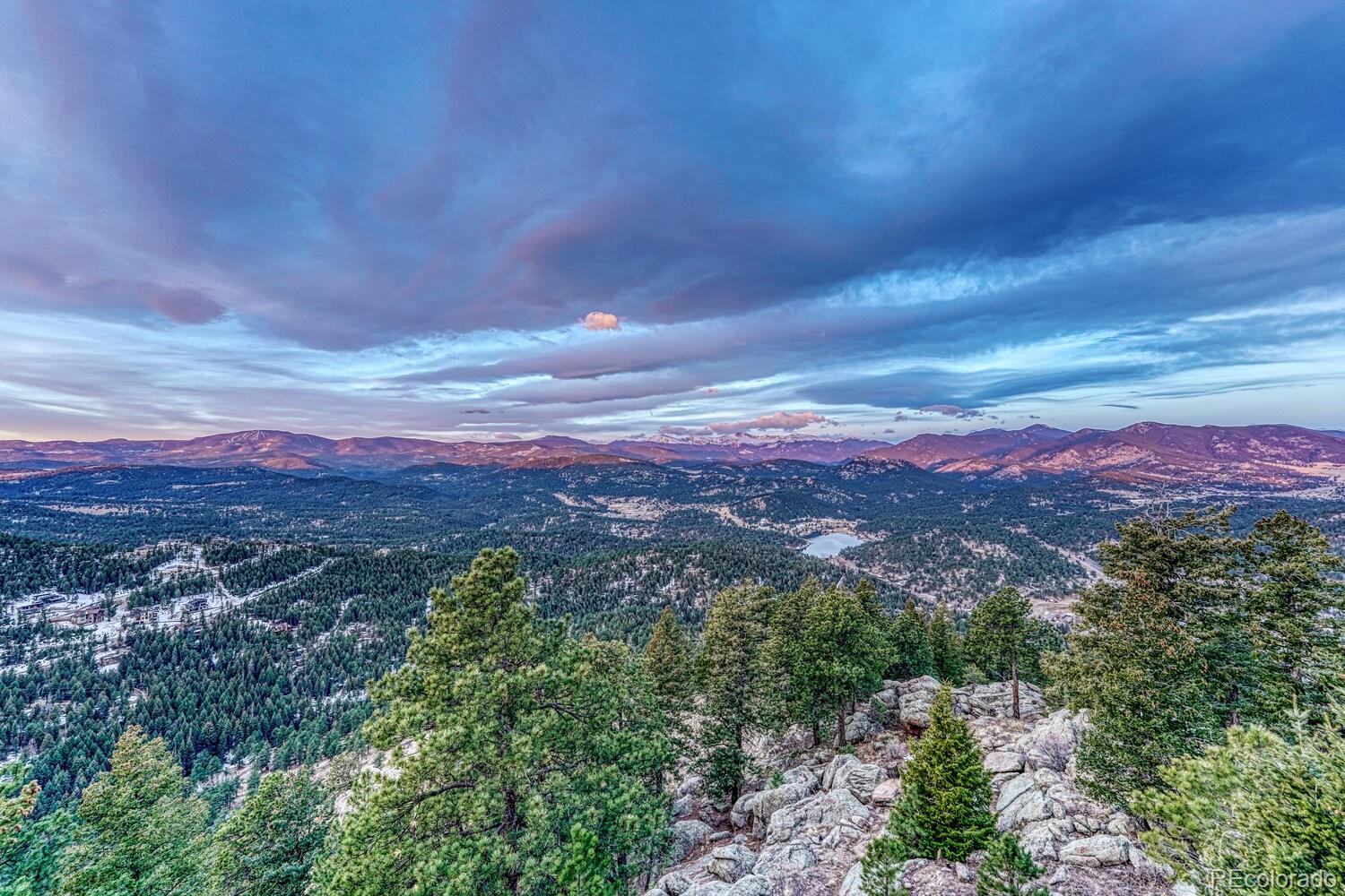 26344 Independence Trail Evergreen, CO 80439 - Photo 4 of 50 a view of a city with mountains in the background