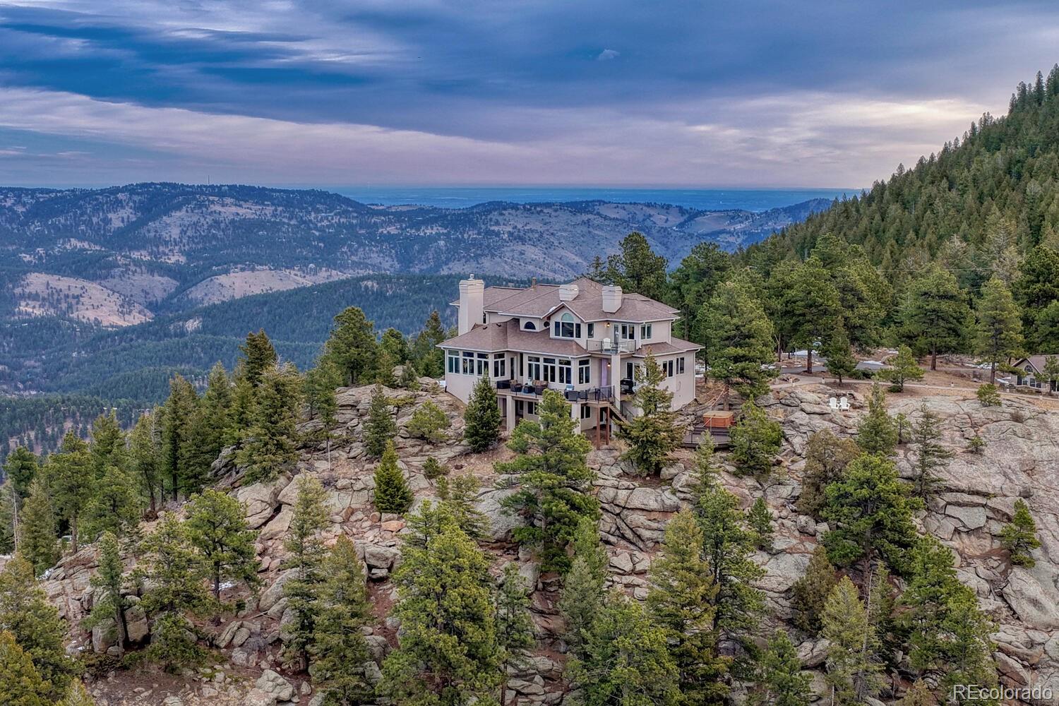 26344 Independence Trail Evergreen, CO 80439 - Photo 41 of 50 an aerial view of a house with a yard