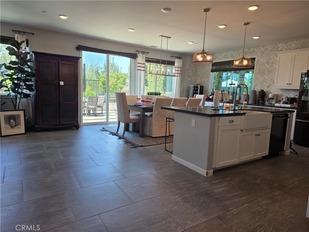 30835 Nature Road Murrieta, CA 92563 - Photo 9 of 44 Open, bright, and large custom tile flooring.