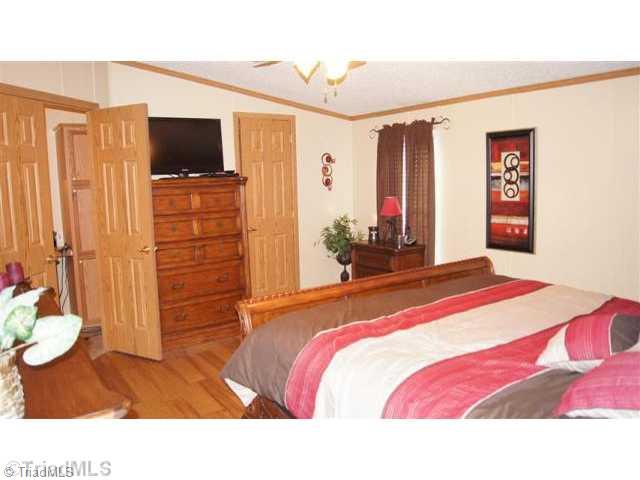 2380 Amostown Road Sandy Ridge, NC 27046 - Photo 10 of 16 Master Bedroom.