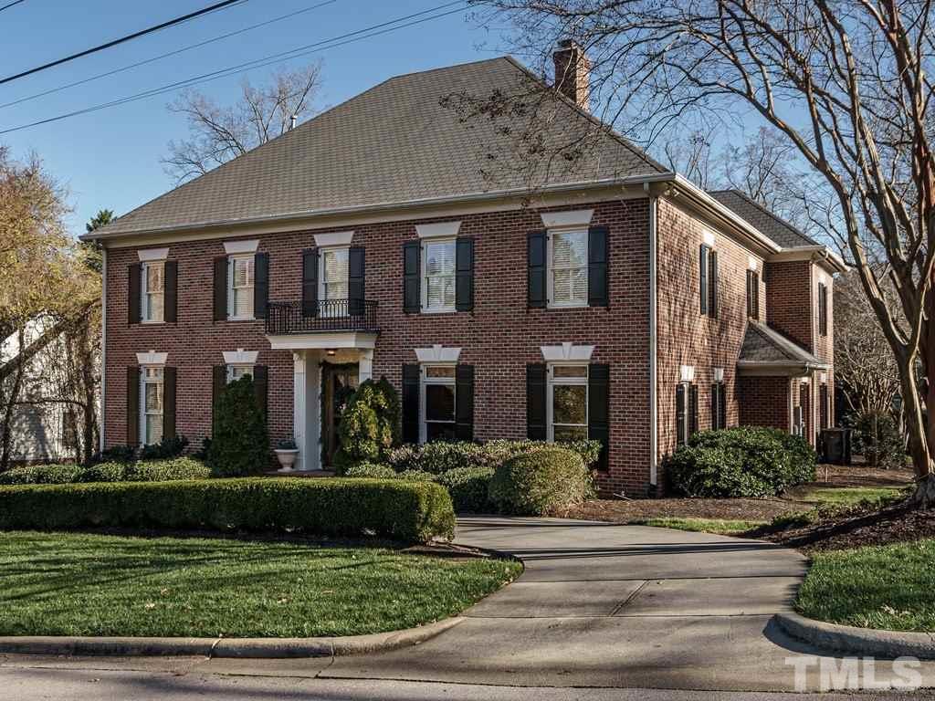 2304 White Oak Road Raleigh, NC 27608 - Photo 1 of 30 a front view of a house with a yard