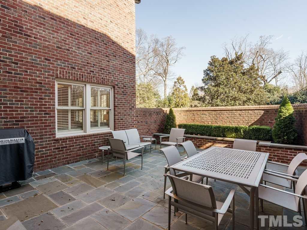 2304 White Oak Road Raleigh, NC 27608 - Photo 23 of 30 a backyard of a house with outdoor seating