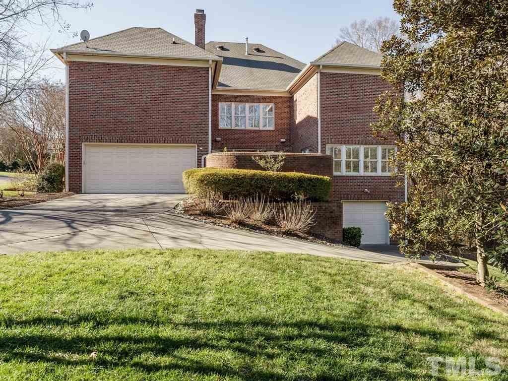 2304 White Oak Road Raleigh, NC 27608 - Photo 26 of 30 a front view of a house with a yard