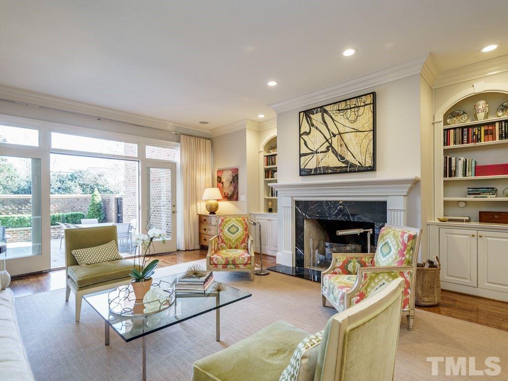 2304 White Oak Road Raleigh, NC 27608 - Photo 6 of 30 a living room with furniture and a fireplace