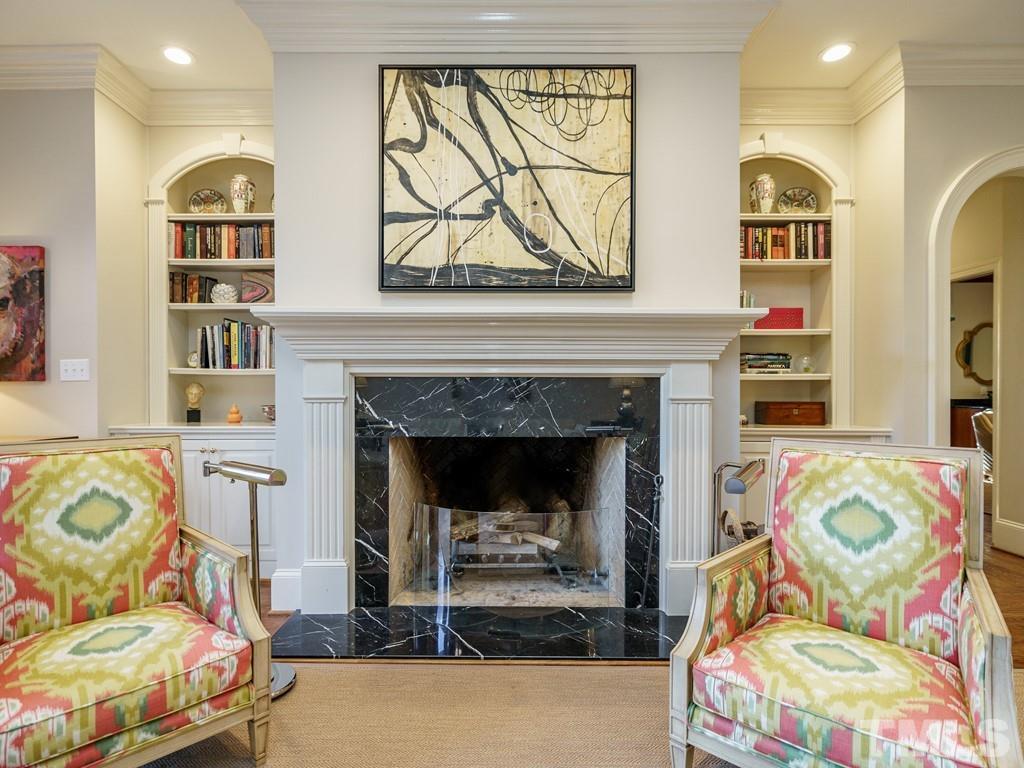 2304 White Oak Road Raleigh, NC 27608 - Photo 7 of 30 a living room with fireplace furniture and a fireplace