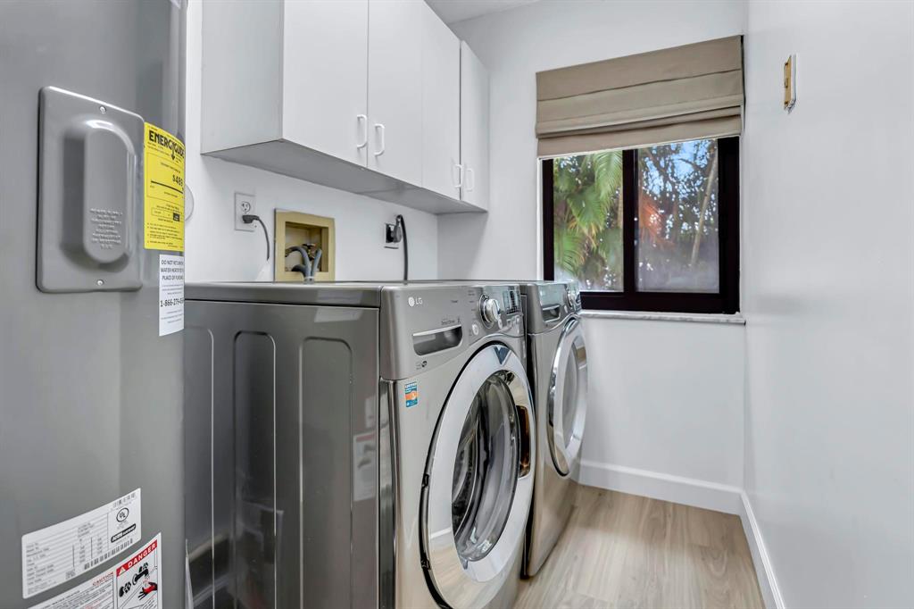 4600 Southwest 164th Terrace Southwest Ranches, FL 33331 - Photo 14 of 36 a utility room with dryer and washer