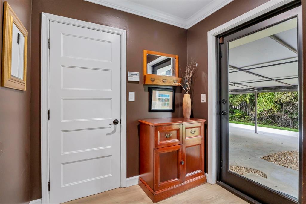 4600 Southwest 164th Terrace Southwest Ranches, FL 33331 - Photo 21 of 36 a view of an entryway with a door