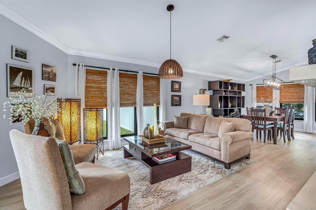 4600 Southwest 164th Terrace Southwest Ranches, FL 33331 - Photo 3 of 36 a living room with furniture and a table