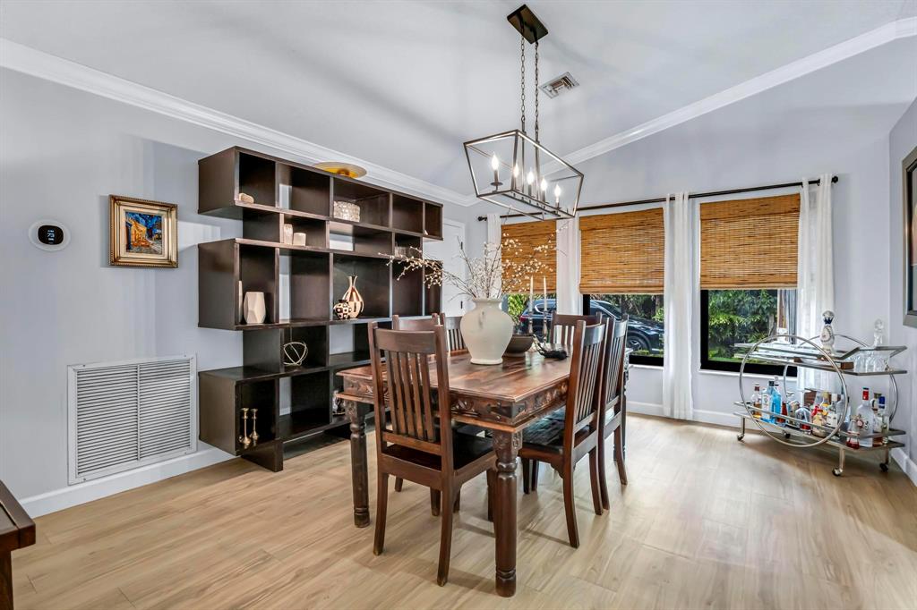 4600 Southwest 164th Terrace Southwest Ranches, FL 33331 - Photo 4 of 36 a view of a dining room with furniture window and wooden floor