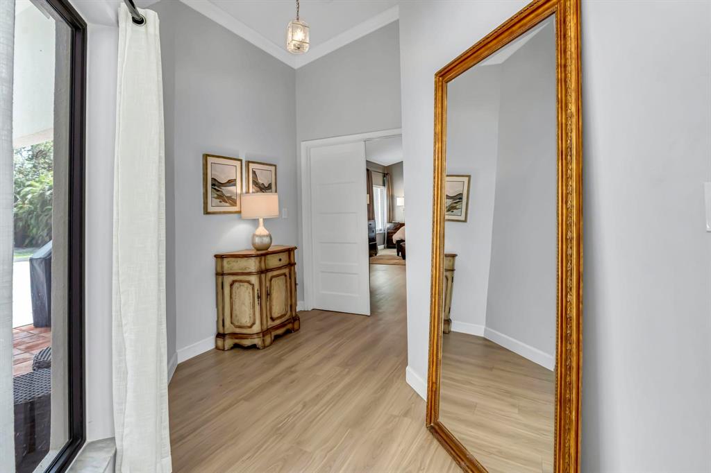 4600 Southwest 164th Terrace Southwest Ranches, FL 33331 - Photo 9 of 36 a view of a hallway with a workspace