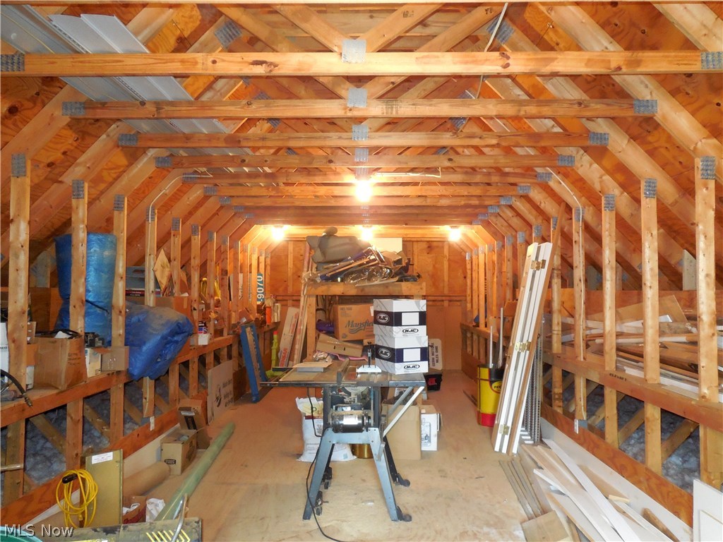 7071 Liberty Road Solon, OH 44139 - Photo 6 of 25 FLOORED LOFT MAKES A GREAT WORKSHOP OR COULD BE FINISHED INTO AN ADDITIONAL LIVING SPACE.