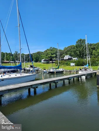 a view of outdoor space sign and a yard