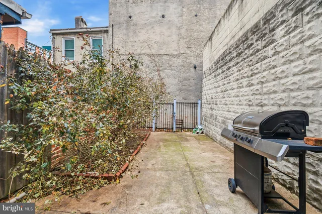 a view of a balcony with an outdoor space