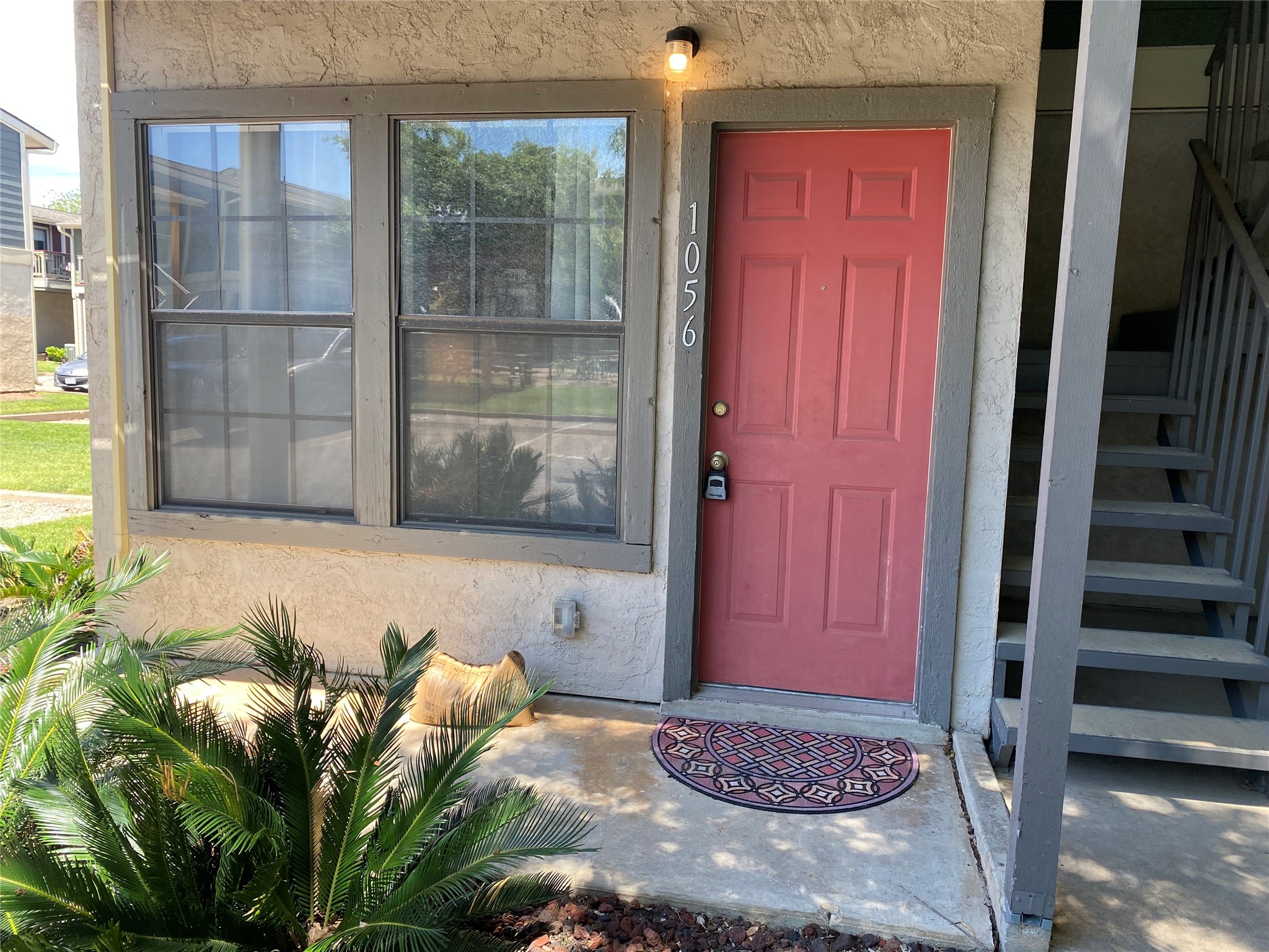 2215 Post Road, Unit 1056 Austin, TX 78704 - Photo 1 of 1 PRIME location in condo community. Front door faces pool. Uncovered parking at front door. There is also a back door.