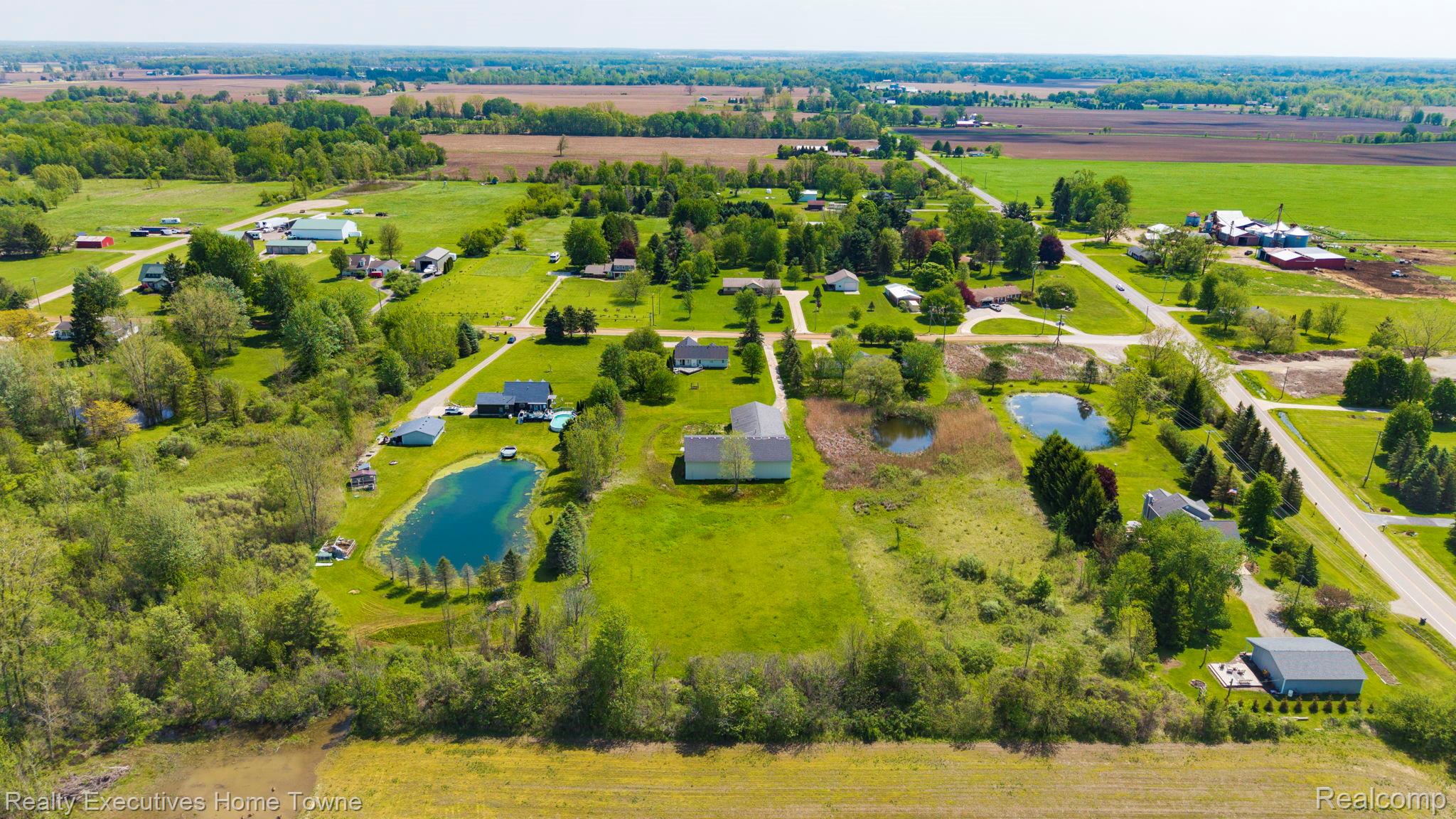 1041 Mackie Road Almont, MI 48003 - Photo 9 of 56 View of rural area featuring a large body of water