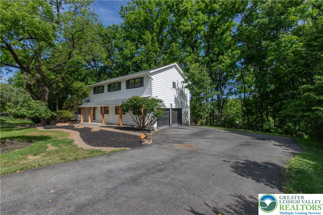 2011 Greenwood Road Allentown, PA 18103 - Photo 2 of 52 A private driveway leads to this charming home nestled among mature trees.