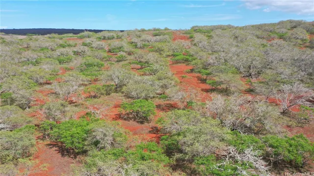 a view of an outdoor space and a mountain view in back