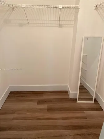 a view of small space with racks on the wall