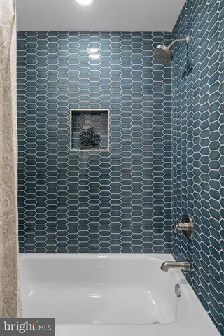 a bathroom with a bathtub