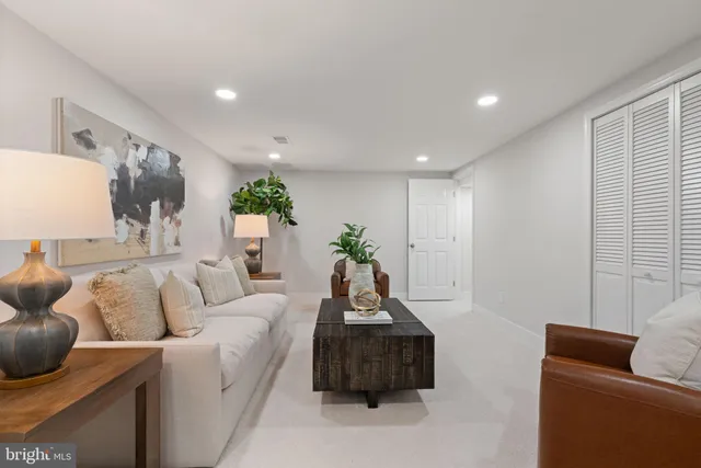 a living room with furniture and a couch