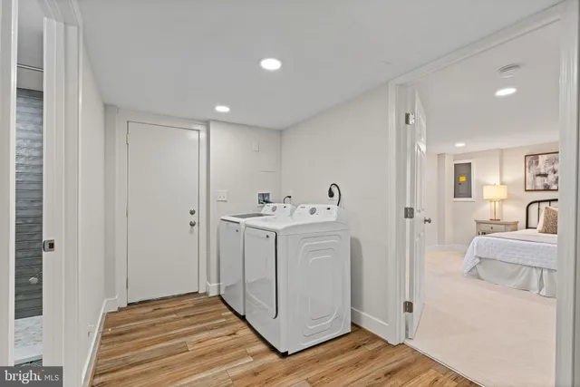 a view of a hallway with two rooms