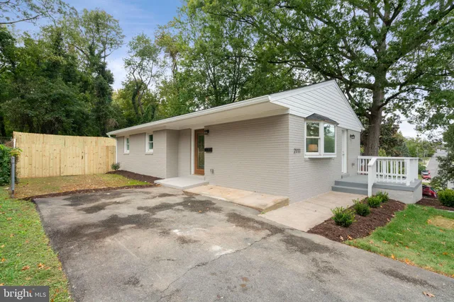 a view of a backyard of the house